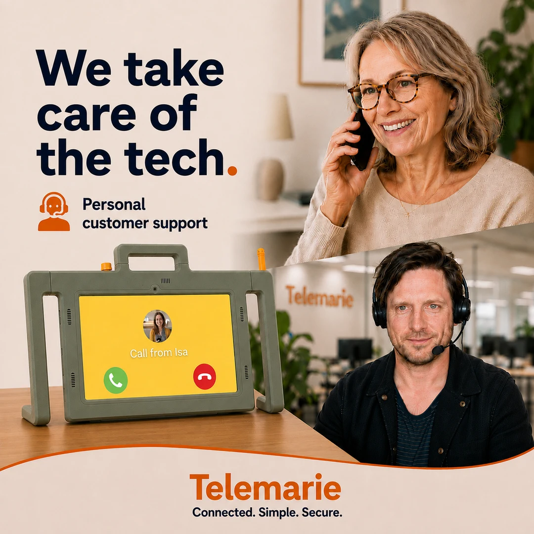Older woman receives personal customer support for her Telemarie senior tablet.
